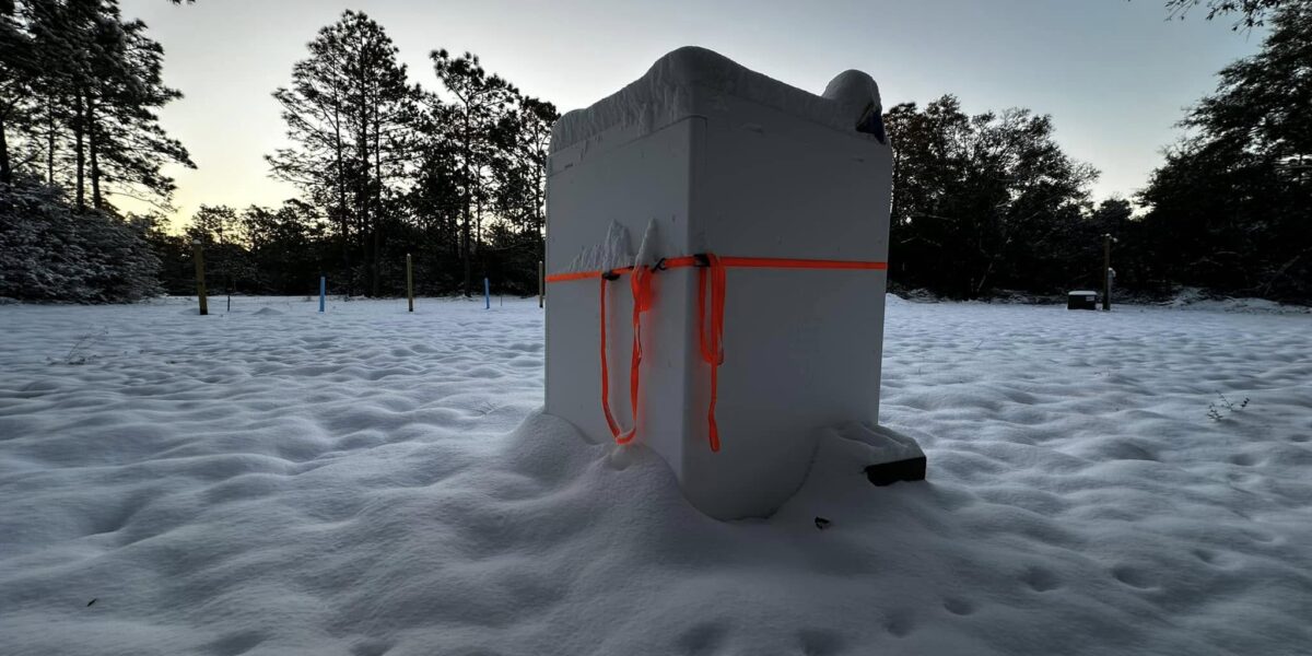 Extra large Styrofoam Cooler by LoBoy protects outdoor equipment in heavy winter snow