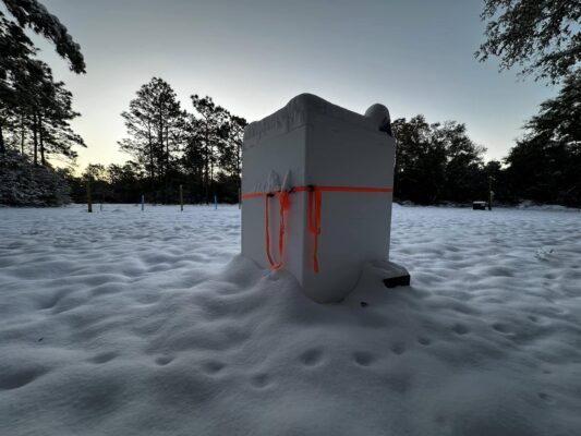 Extra large Styrofoam Cooler by LoBoy protects outdoor equipment in heavy winter snow