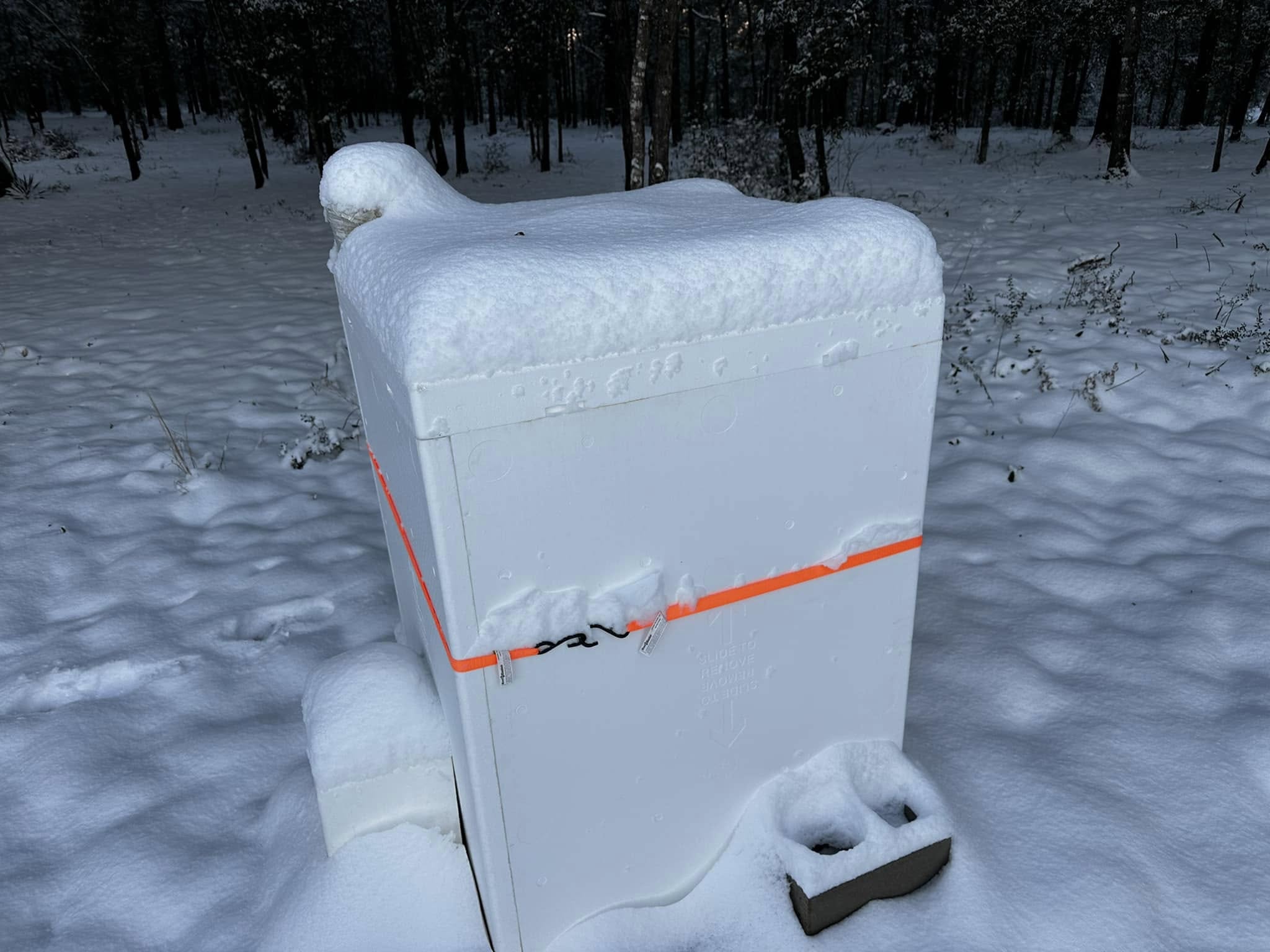 Extra large Styrofoam Cooler by LoBoy protects outdoor equipment in heavy winter snow